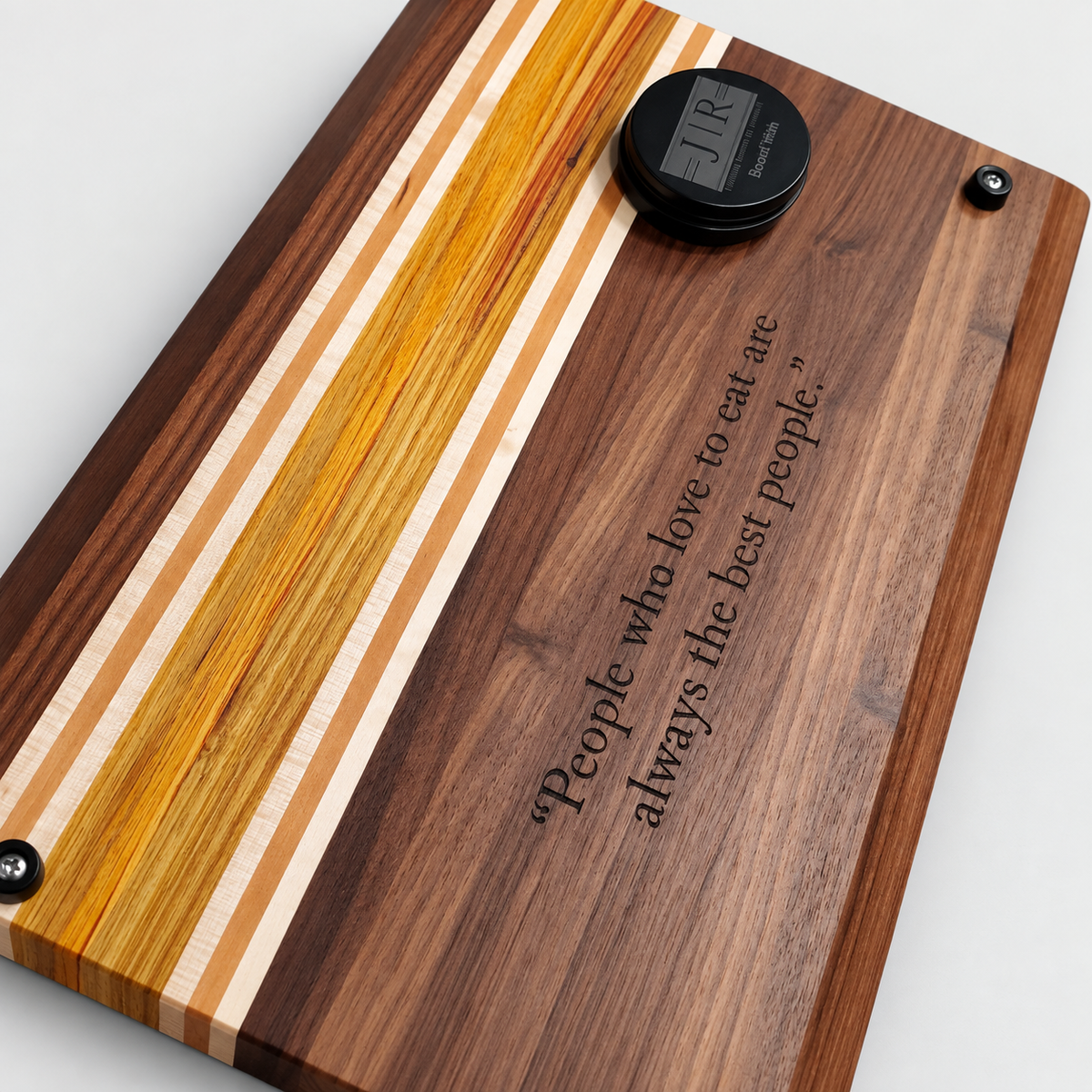 Handcrafted Walnut & Canary Wood Cutting Board – 19 x 12, detail view on a light gray background