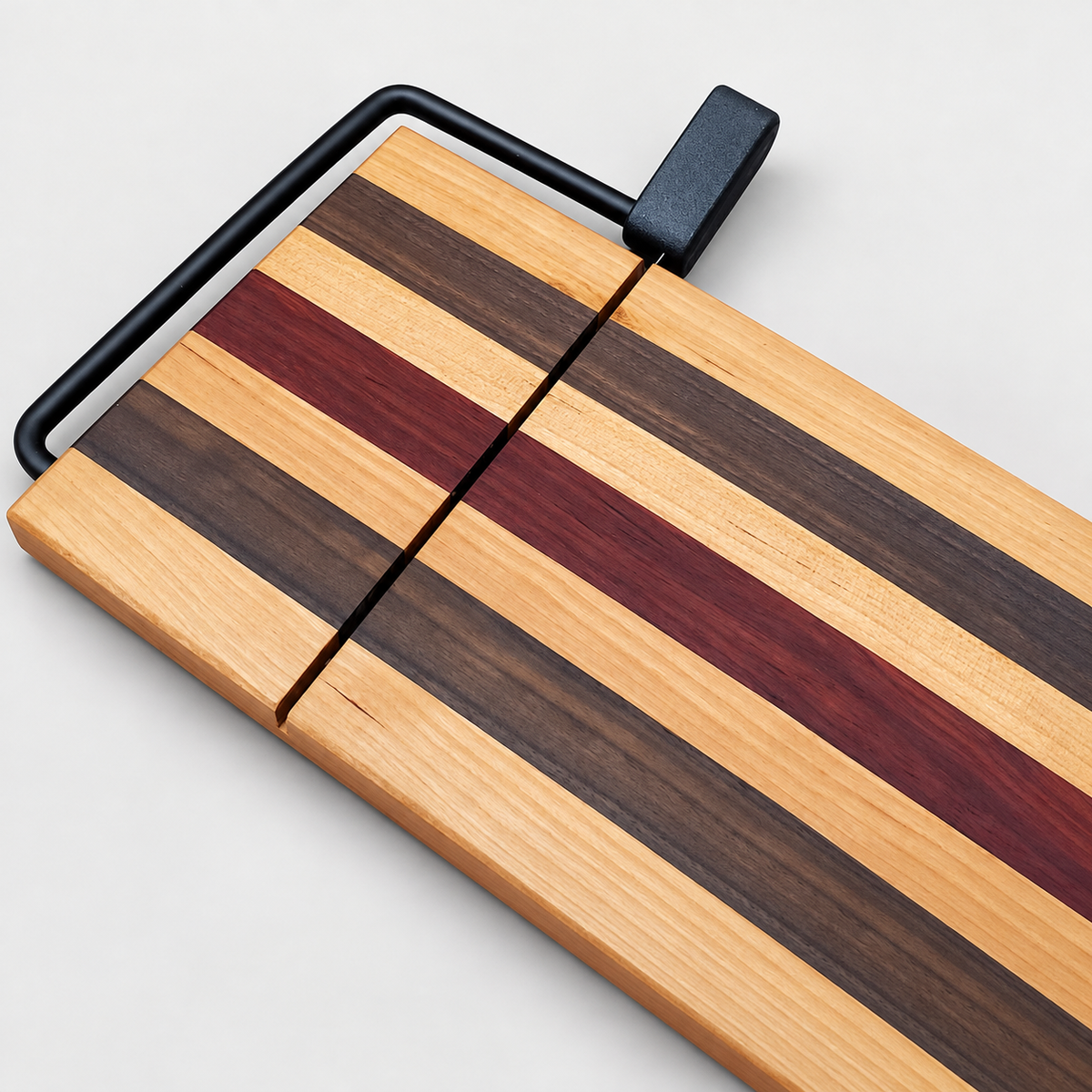 Maple, Walnut & Purpleheart Cheese Slicer, detail view on a light gray background