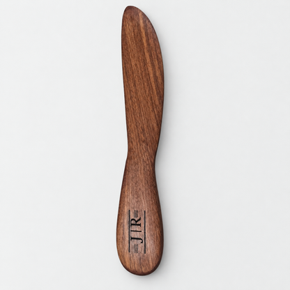 8in Wooden Butter Knives, detail view on a light gray background
